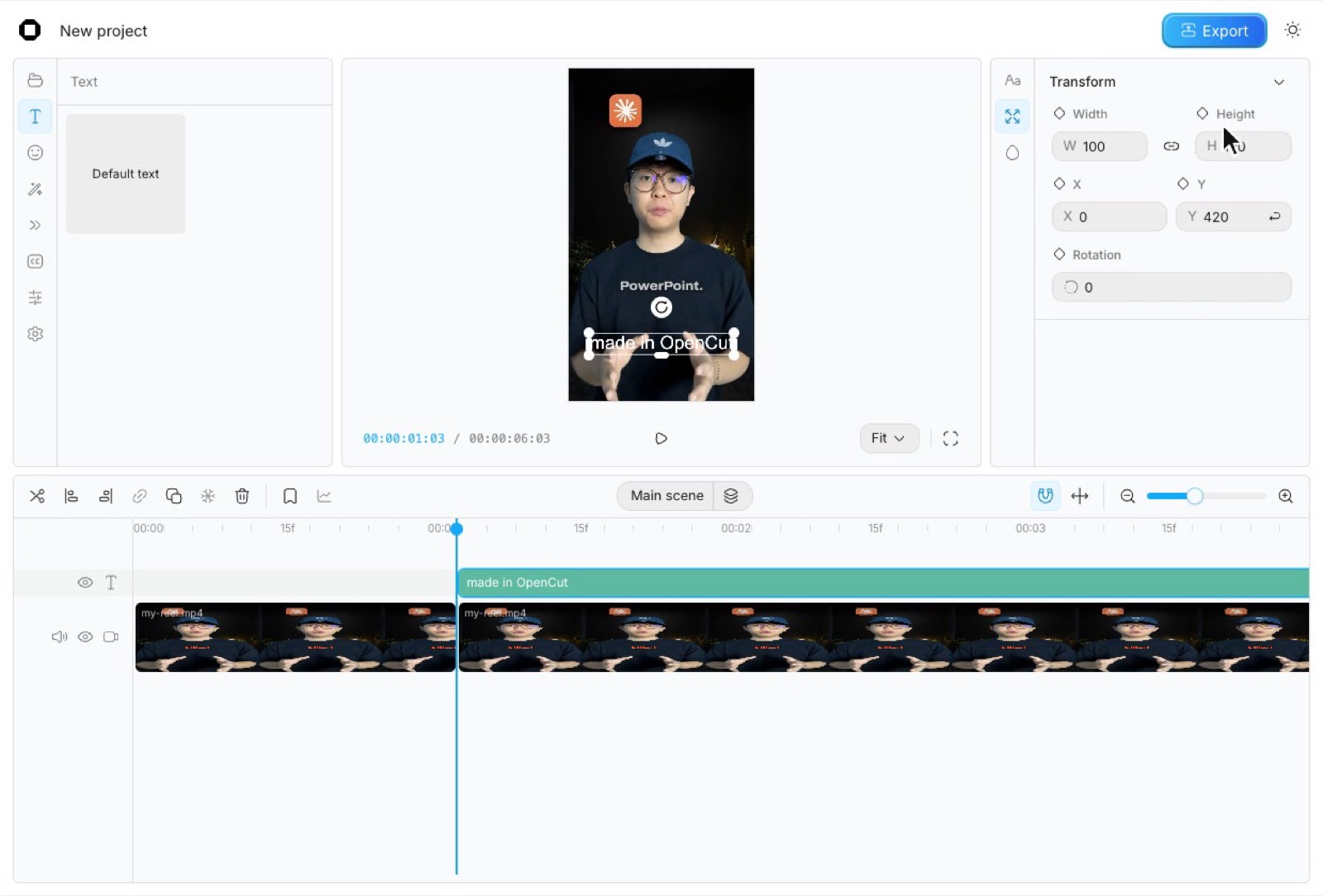 The OpenCut editor with a text layer added on a track above the video clip