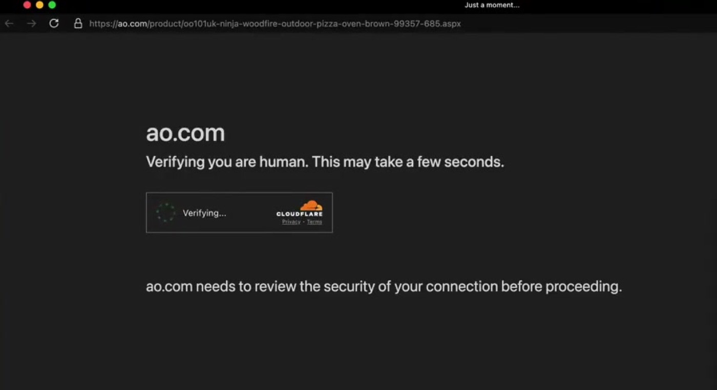 A live Cloudflare verification screen standing in front of a retail site's content